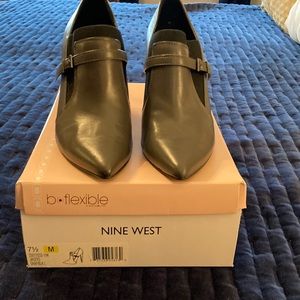 Grey Nine West bootie with 3” heel